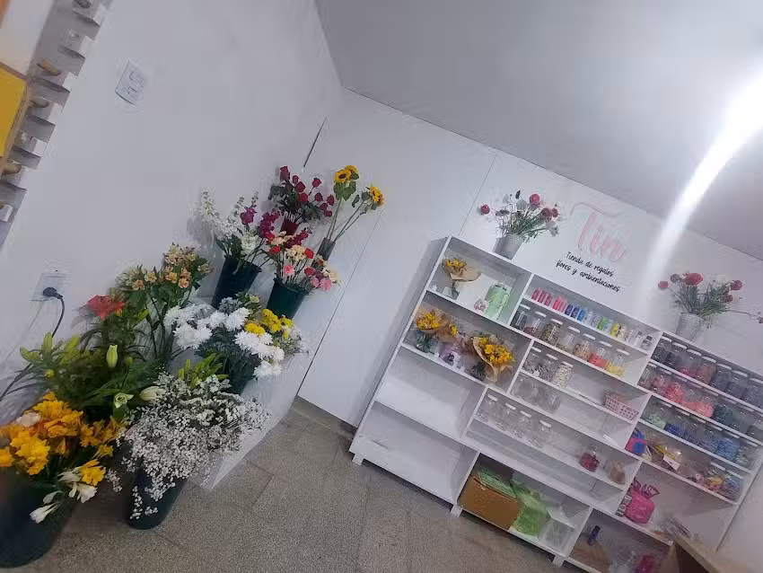 Tin tienda de regalos, flores y ambientaciones